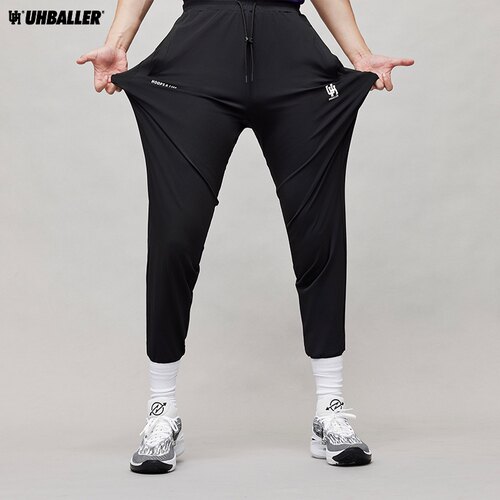UH秋冬运动长裤科技纤维高弹速干美式篮球束脚裤体育生训练裤修身