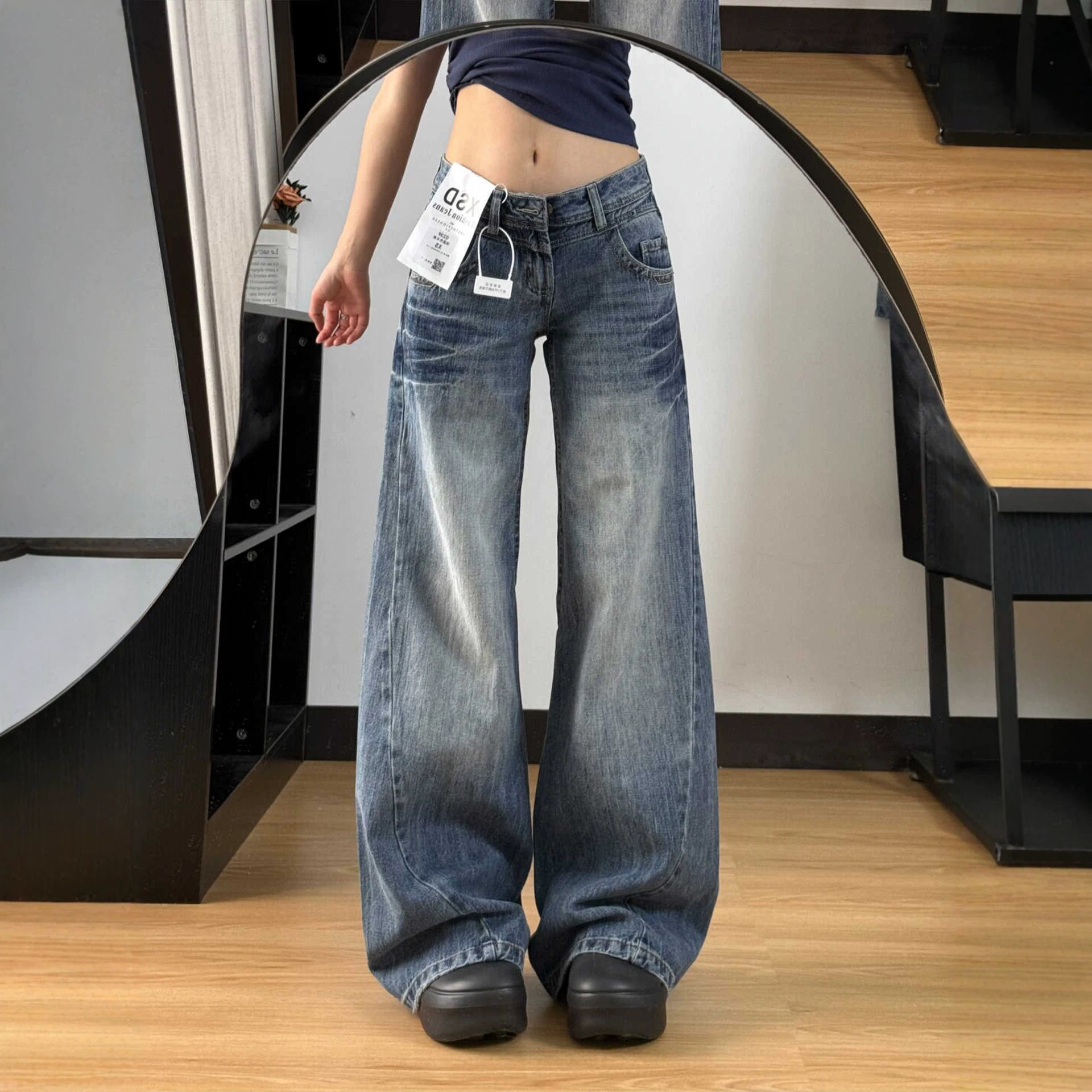 深蓝色微喇牛仔裤女2026秋季新款低腰百搭宽松显瘦不贴腿阔腿裤子