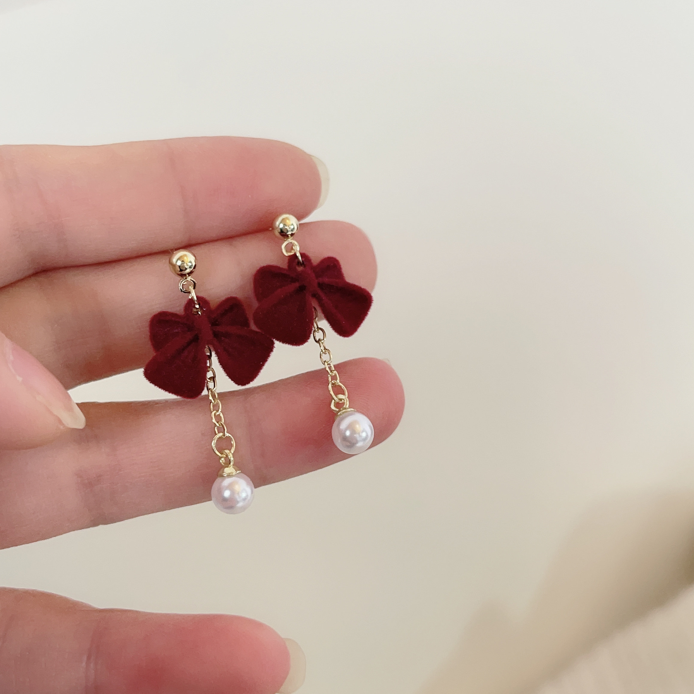 新款酒红色蝴蝶结流苏耳环女2025年新年喜庆耳饰秋冬少女耳钉银针