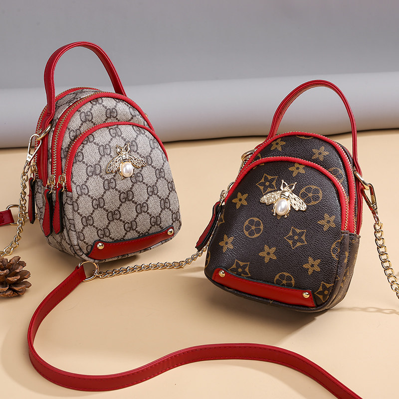 手机斜跨包女2020韩版新款迷你小包时尚百搭贝壳包单肩零钱链条包