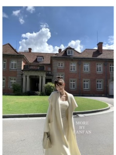 2025韩版复古风大翻领斗篷女秋季新款慵懒风过膝气质系带毛衣外套