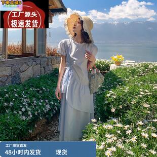蓝色在逃公主泡泡袖连衣裙女2025夏新款法式设计感荷叶边不规则裙