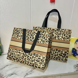 腹膜无纺布手提袋服装 店袋子男女环保商场购物袋定做礼品袋塑料袋