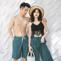 Cặp đôi đồ bơi nữ bikini bikini bốn mảnh ngực nhỏ tụ tập váy dài kỳ nghỉ cặp đôi cài đặt mùa xuân nóng bỏng - Vài đồ bơi 	đồ đôi gia đình đi biển