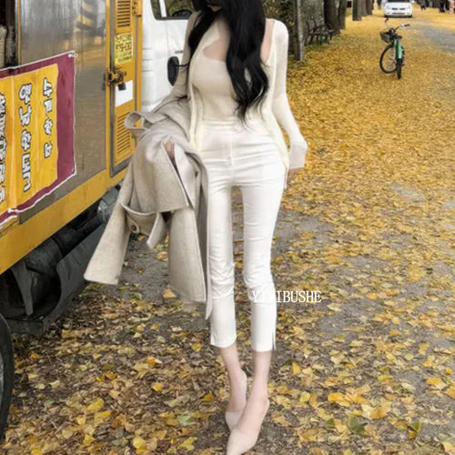 显瘦弹力高腰裤脚开叉九分休闲裤