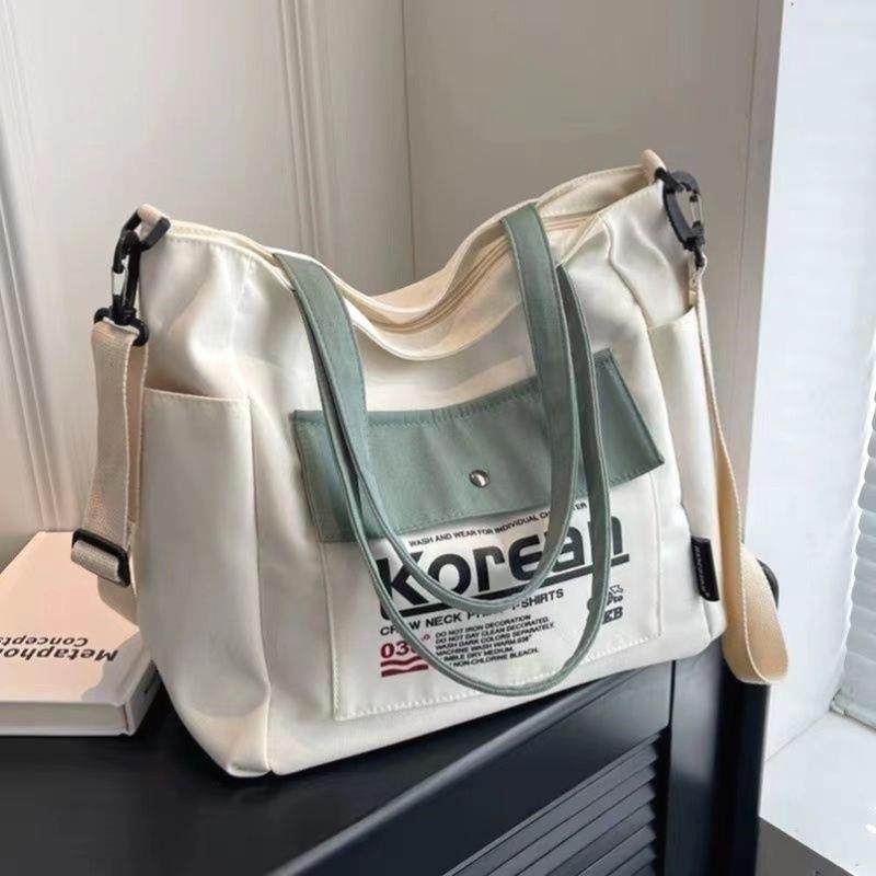 大容量帆布包包女2024新款潮大学生上课手提袋百搭单肩包