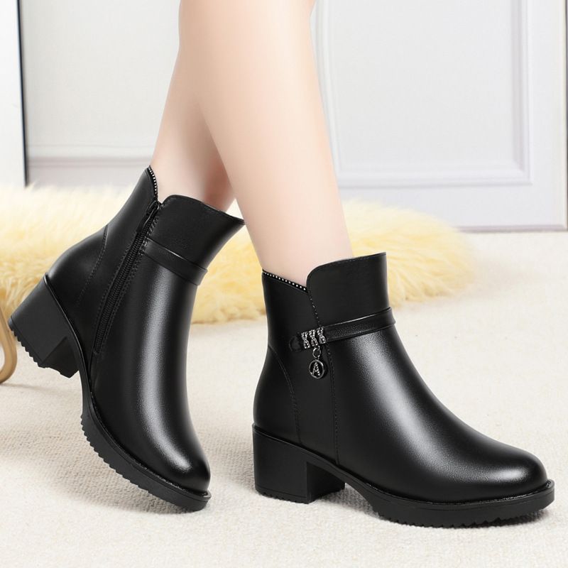 冬季新款中跟软皮女靴防滑坡跟加