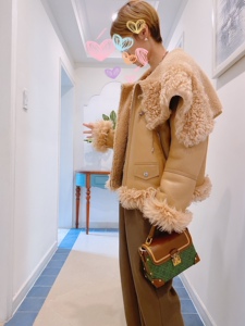 九尺皮草 冬新款美利奴皮毛一体天使之翼女大翻领真皮皮草外套