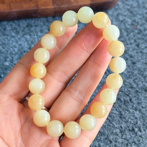 亏出正宗新疆和田玉糖白玉手串