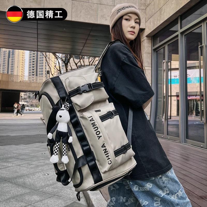 新款大容量潮流旅行包双肩背男出差旅游可携式收纳包女运动健身包