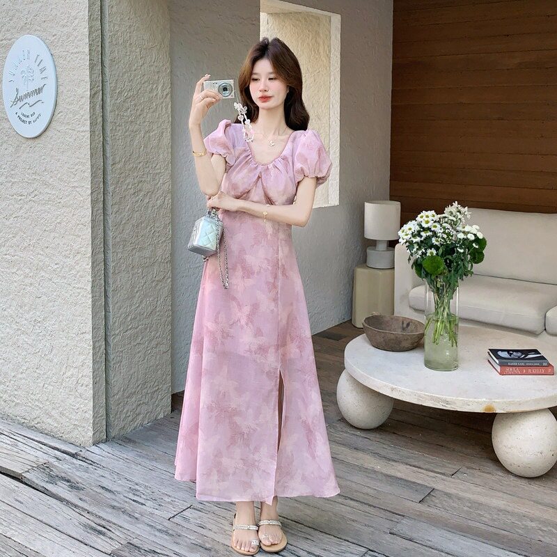 粉色大方得体绝美提花泡泡袖连衣裙女2026夏季新款设计感开叉长裙