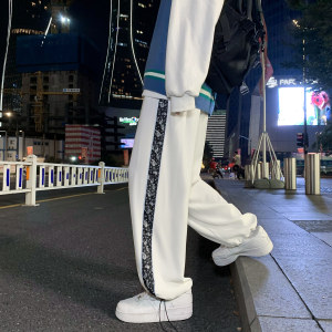 21新款男士反光腰果花休闲裤丝滑冰丝抽绳松紧宽松裤现货ck61-p55图片