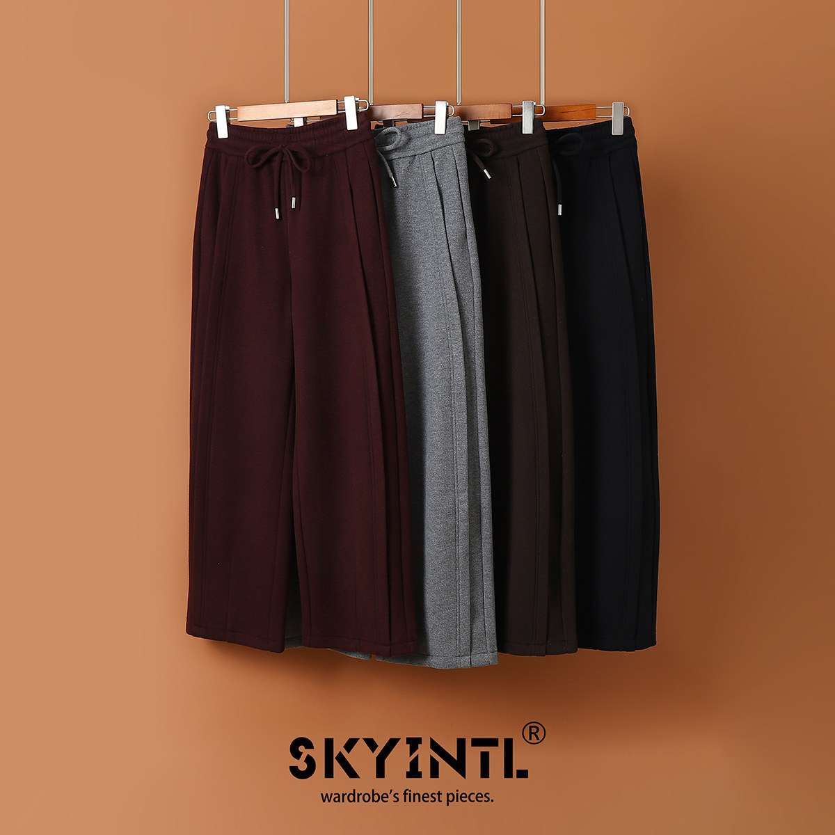 SKYINTL冬季加绒保暖裤子女2025新款时尚显瘦桑蚕丝羊绒弯刀裤女
