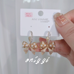 艾妮薇妮925银针蝴蝶结珍珠耳钉女半圈设计感精致甜美夸张耳饰