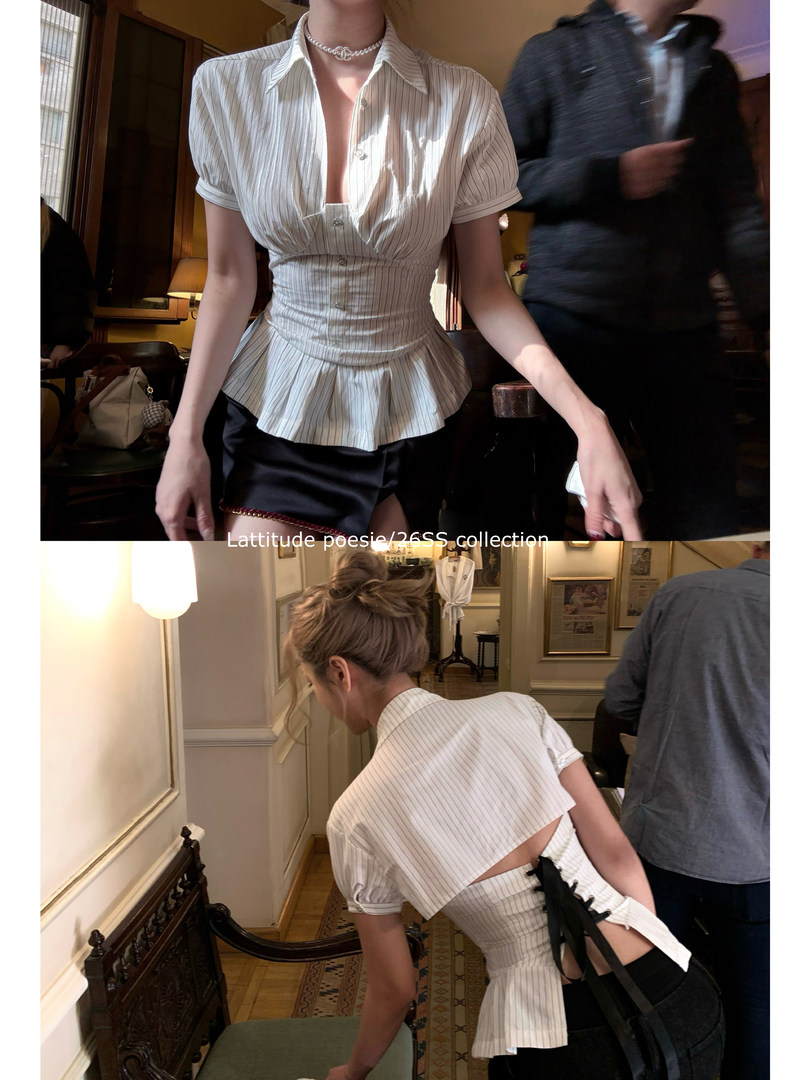 Model wearing a white striped short-sleeve blouse with a cinched waist and peplum detail