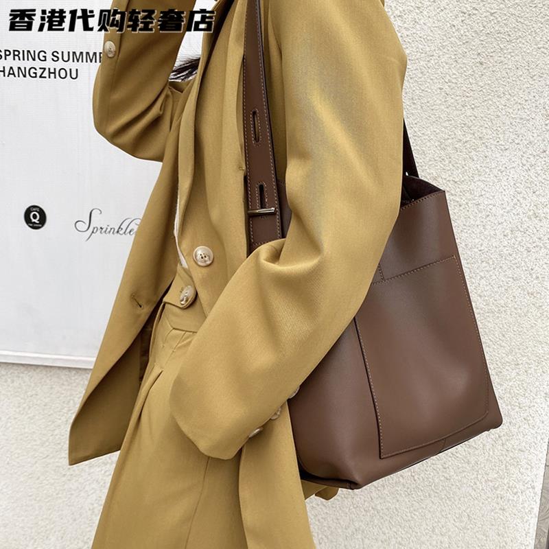 法国官方正品MK BM 2025新款女包真皮大容量水桶包百搭简约单肩包