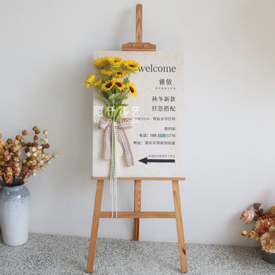 店铺开业门口指示牌花艺橱窗装饰