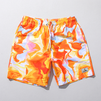 海边沙滩裤橙色印花速干游泳裤拍照好看鲜亮旅行度假宽松大花裤衩