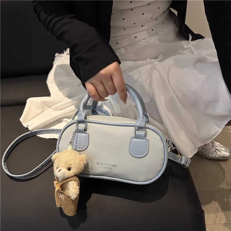 今年流行纯色简约保龄球包女包2025新款休闲高颜值质感手提单肩包