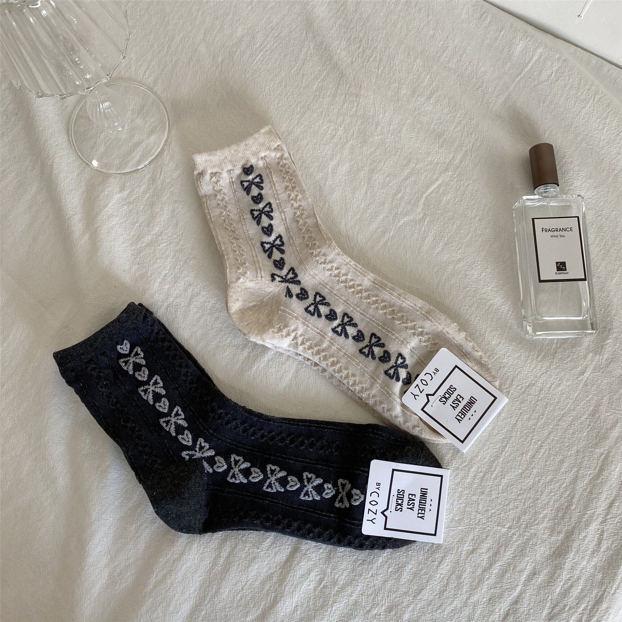 韩国女袜cozy秋冬新款竖排蝴蝶结爱心袜简约百搭中筒女士成人袜子