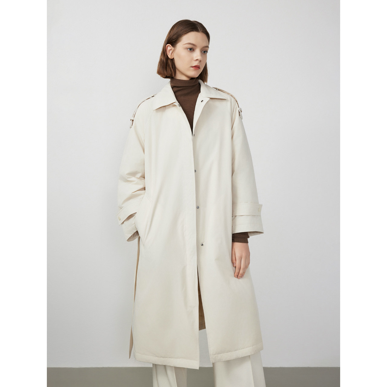 可拆卸帽子 配置皮带 可调节袖袢