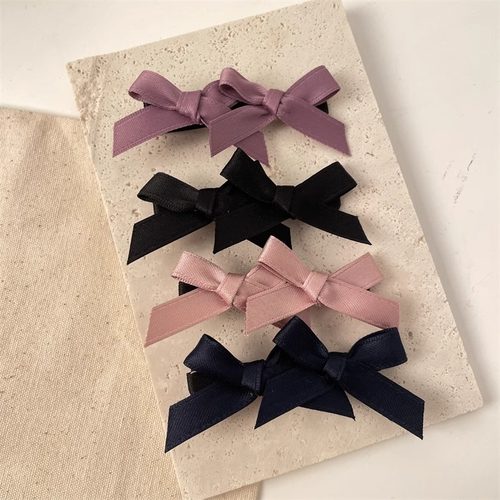 缎面双蝴蝶结侧边夹刘海夹