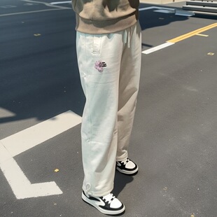 安踏宽松保暖加绒裤子女2024冬季潮流字母针织运动长裤162448307N