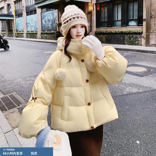 奶呼呼黄色连帽刺绣羽绒服女2025年冬季新款韩版设计感白鸭绒外套