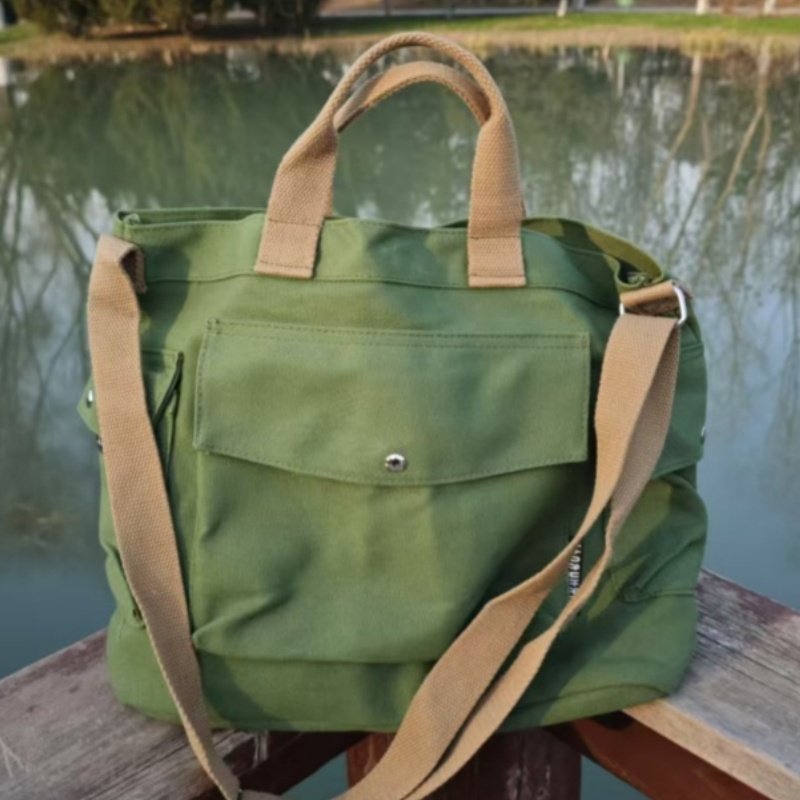 用不坏斜挎帆布包女包时尚休闲手提包情侣通用款书包单肩包男包