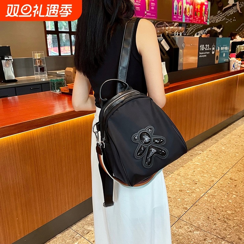 牛津布双肩包女新款超火时尚背包休闲百搭单肩两用包旅游包