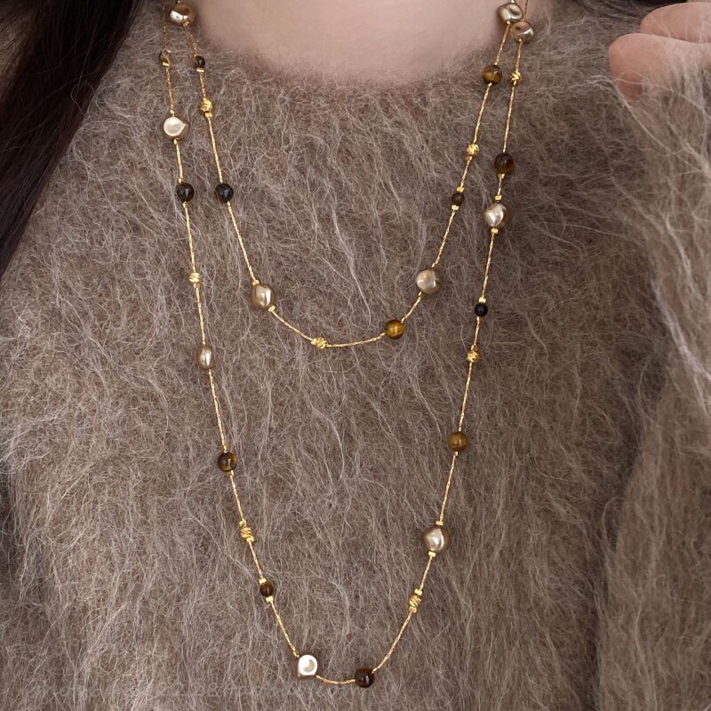 美拉德虎眼石珍珠项链女秋冬季2025爆款百搭轻奢高级感长款毛衣链