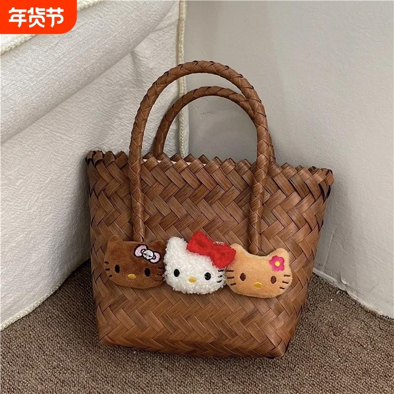 夏日卡通猫咪手提包女2026新款藤编包包外出便携收纳百搭小包