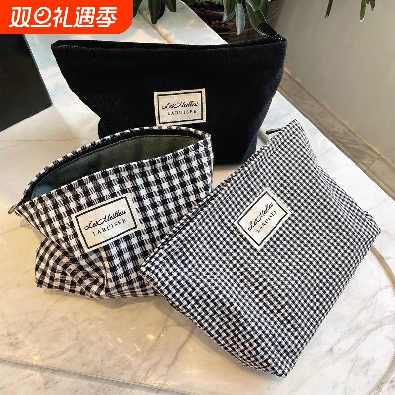 化妆包女大容量便携黑白高级感收纳包拉链ins收纳袋随身可爱格子