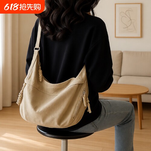 斜挎饺子包女2025新款包包通勤单肩背包日系男运动轻便黑色绿色