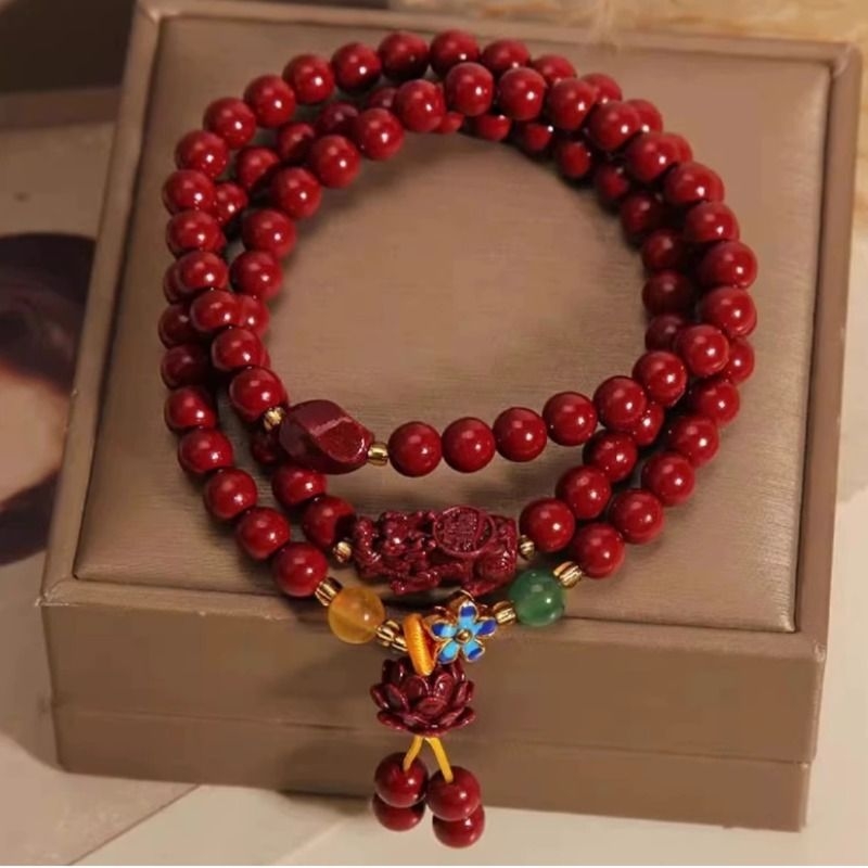 晶饰缘朱砂三圈莲花貔貅手串