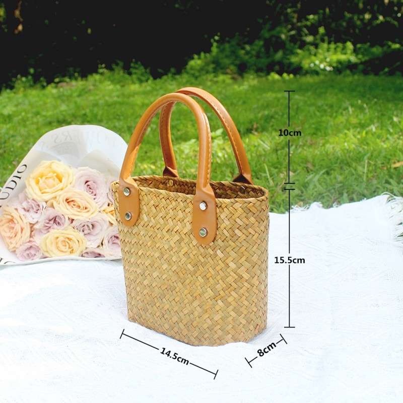 ins草编织小包包夏季新款休闲度假女包菜篮子手工编织手提度假包