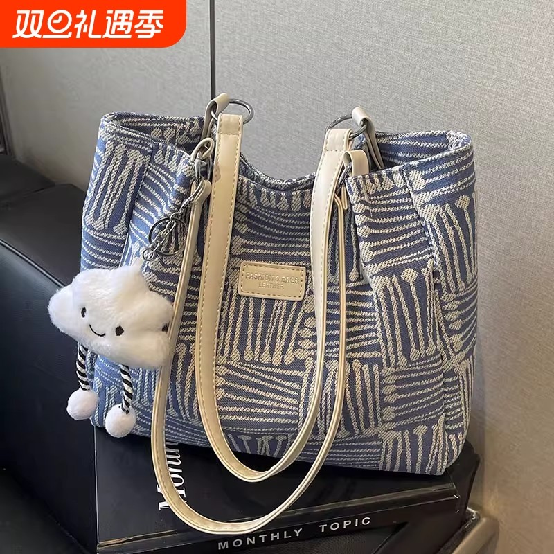 大容量包包2025新款女士单肩包小众百搭通勤上班托特包手提女包