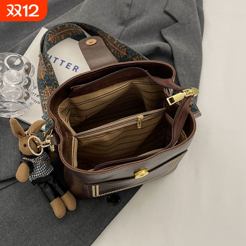 伊布古奇高级感包包女新款小众水桶包通勤百搭单肩斜挎包流行女包