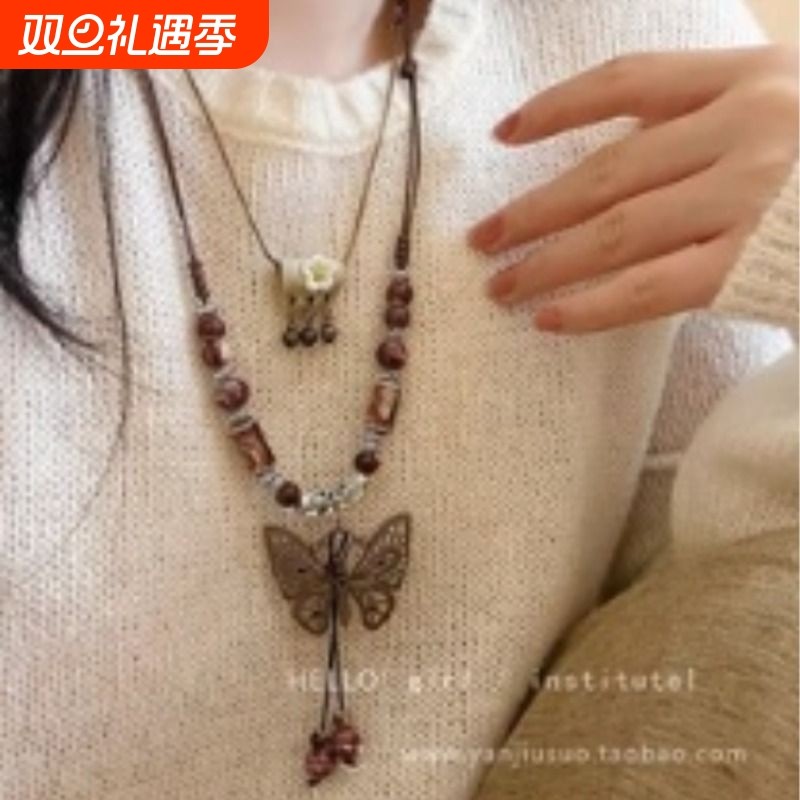 族吉复古民族风陶瓷蝴蝶铃铛吊坠项链女新款潮长款毛衣链女配饰品