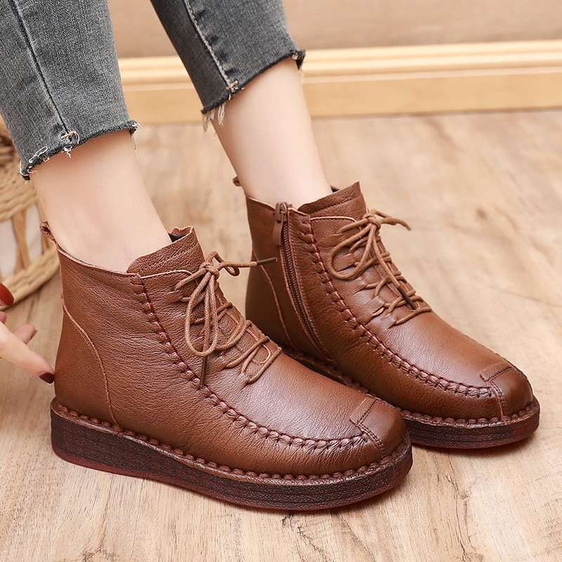 他她女孩牛筋底马丁靴女冬季新款真皮妈妈棉鞋女平底短靴加绒圆头