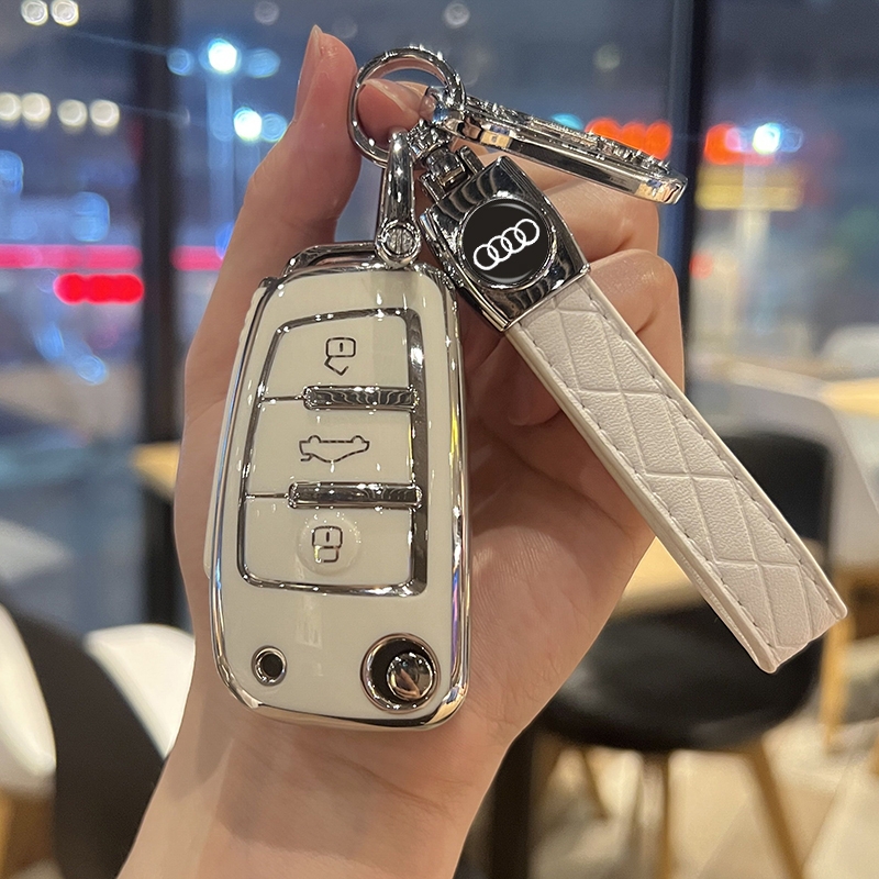 奥迪q2l车钥匙套保护壳a1/a3/a6折叠扣汽车包q3轿跑扣q7tt链全包