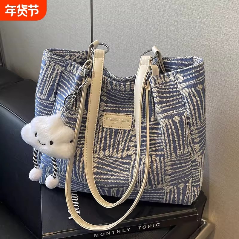 大容量包包2025新款女士单肩包小众百搭通勤上班托特包手提女包