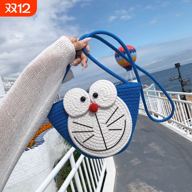 可爱卡通夏天包包女2023新款潮ins丑萌单肩水桶包小众斜挎编织包