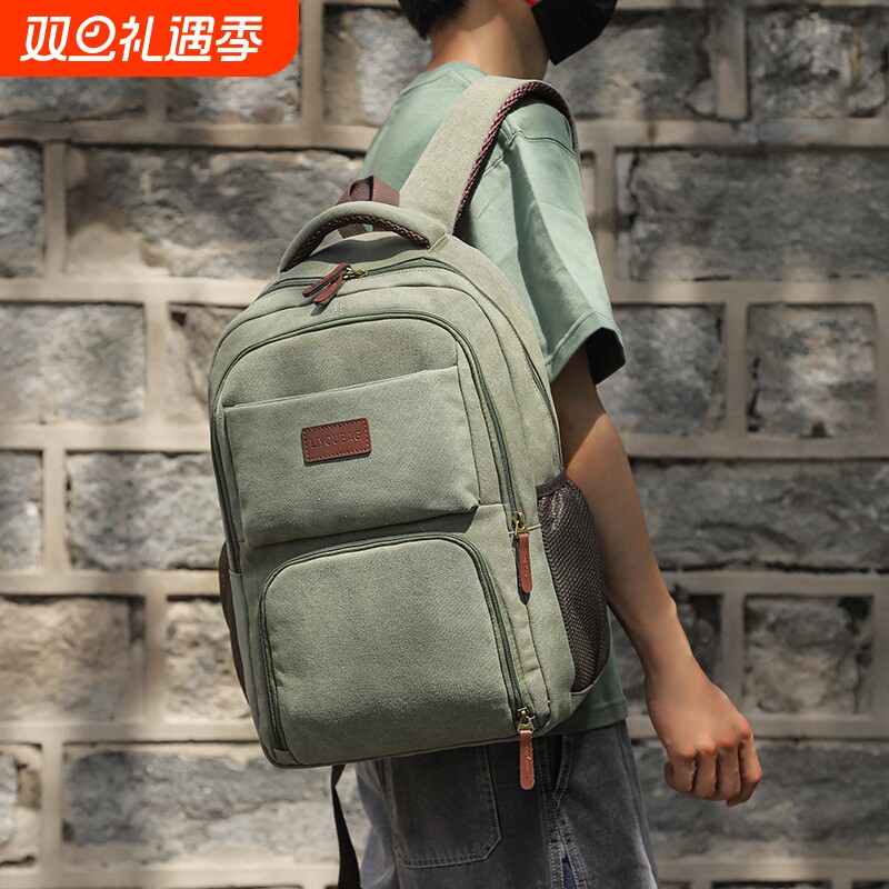 耐磨双肩包男学生书包男初中高中大容量帆布电脑包出差旅行背包女