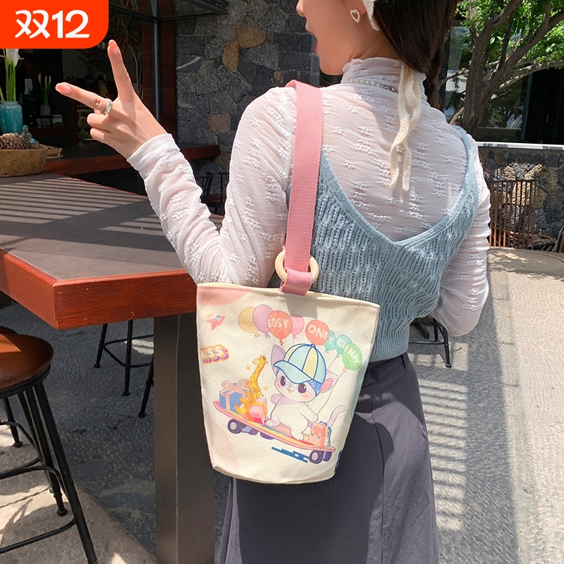 帆布包女大容量手提水桶包