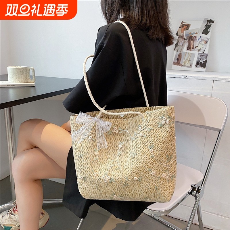 2025新款夏季潮韩版草编蕾丝单肩包手提包女士大容量水桶包包