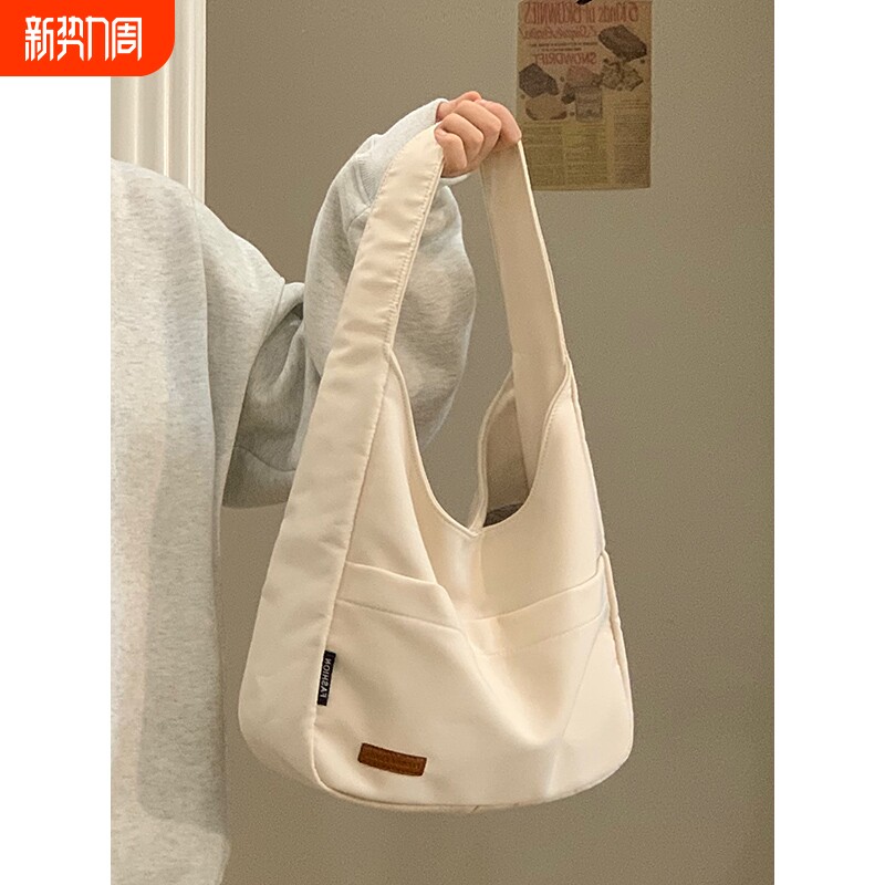 帆布包2025新款ins大容量简约包包大学生上课单肩包休闲防水高