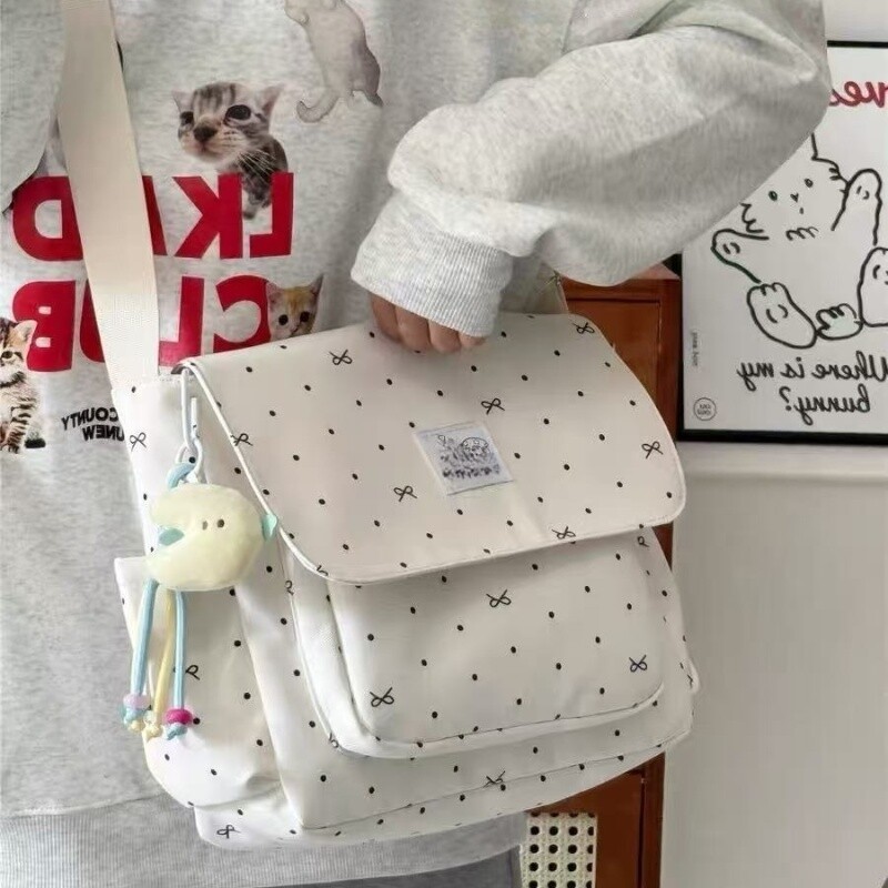 少女学生大容量学生上课百搭纯色斜挎包日系ins邮差包碎花布包