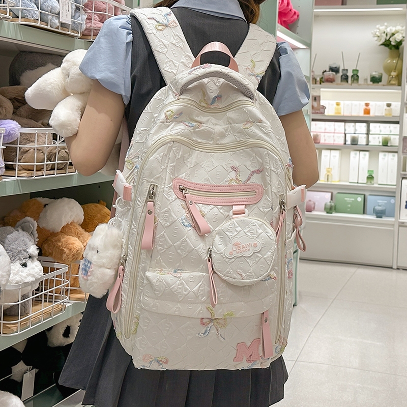 蝴蝶结书包女初中生大容量背包小学生高中女生双肩包