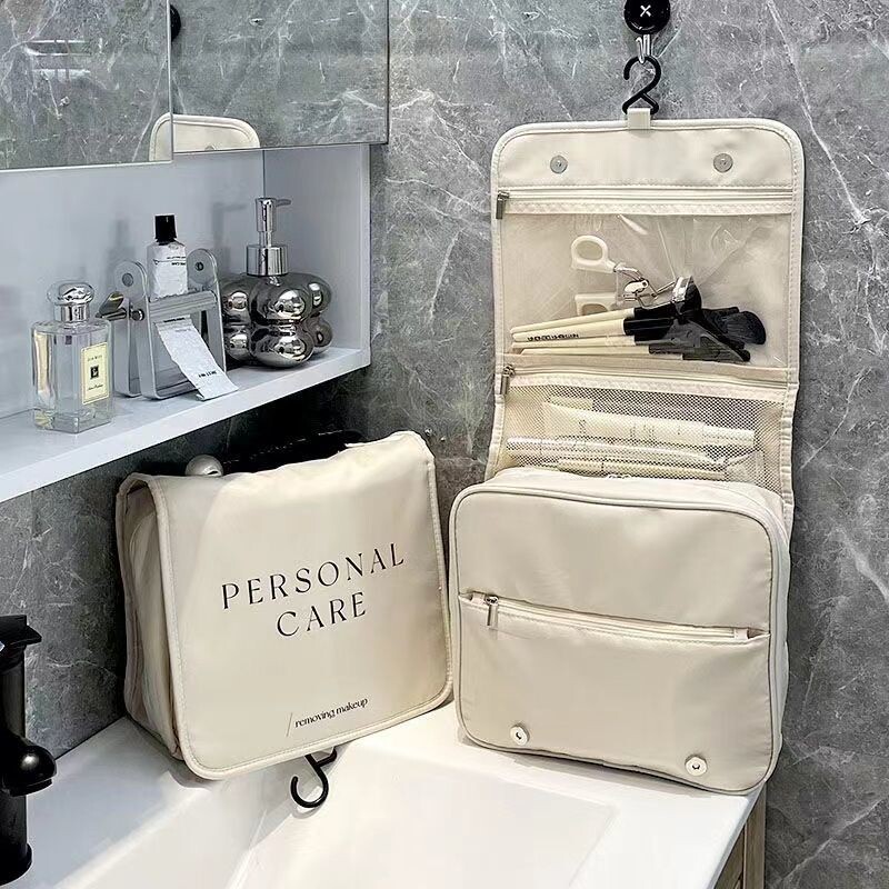 化妆包女新款便携手提大容量出差旅行化妆品收纳洗漱包ins可挂